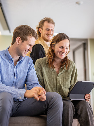 Photo of colleagues chatting on a building site