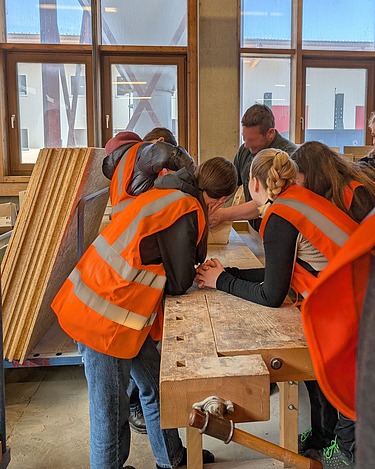 Children in the production hall in Aichach
