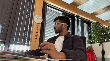 Saikrishna at his workplace