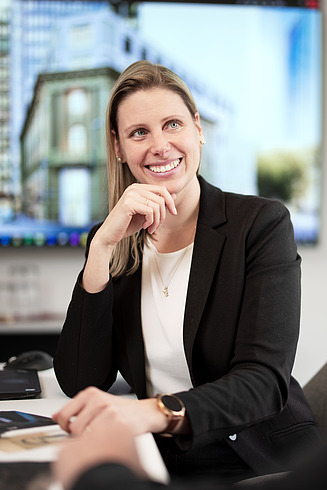 A woman in a meeting room