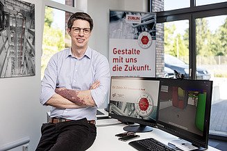 Kaufmännischer Bereichsleiter der TGA bei ZÜBLIN ZÜBLIN Mitarbeiter lächelt in die Kamera.