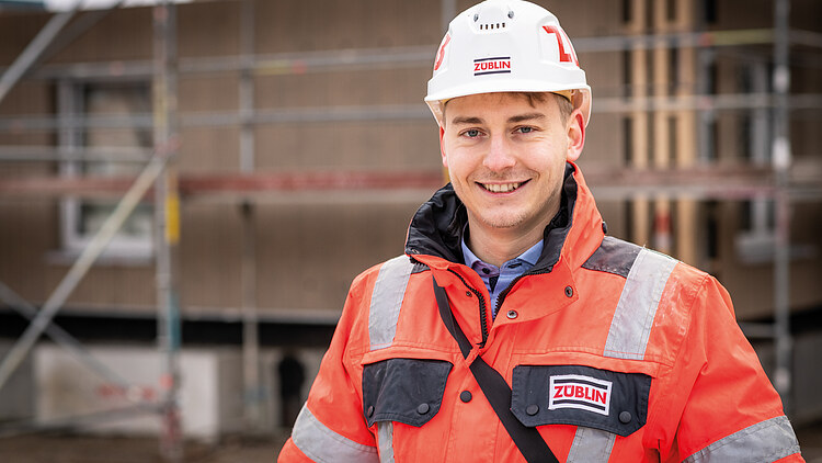 Workers wearing high-visibility clothing on a building site