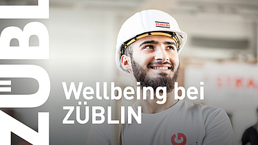 A ZÜBLIN employee wearing a hard hat